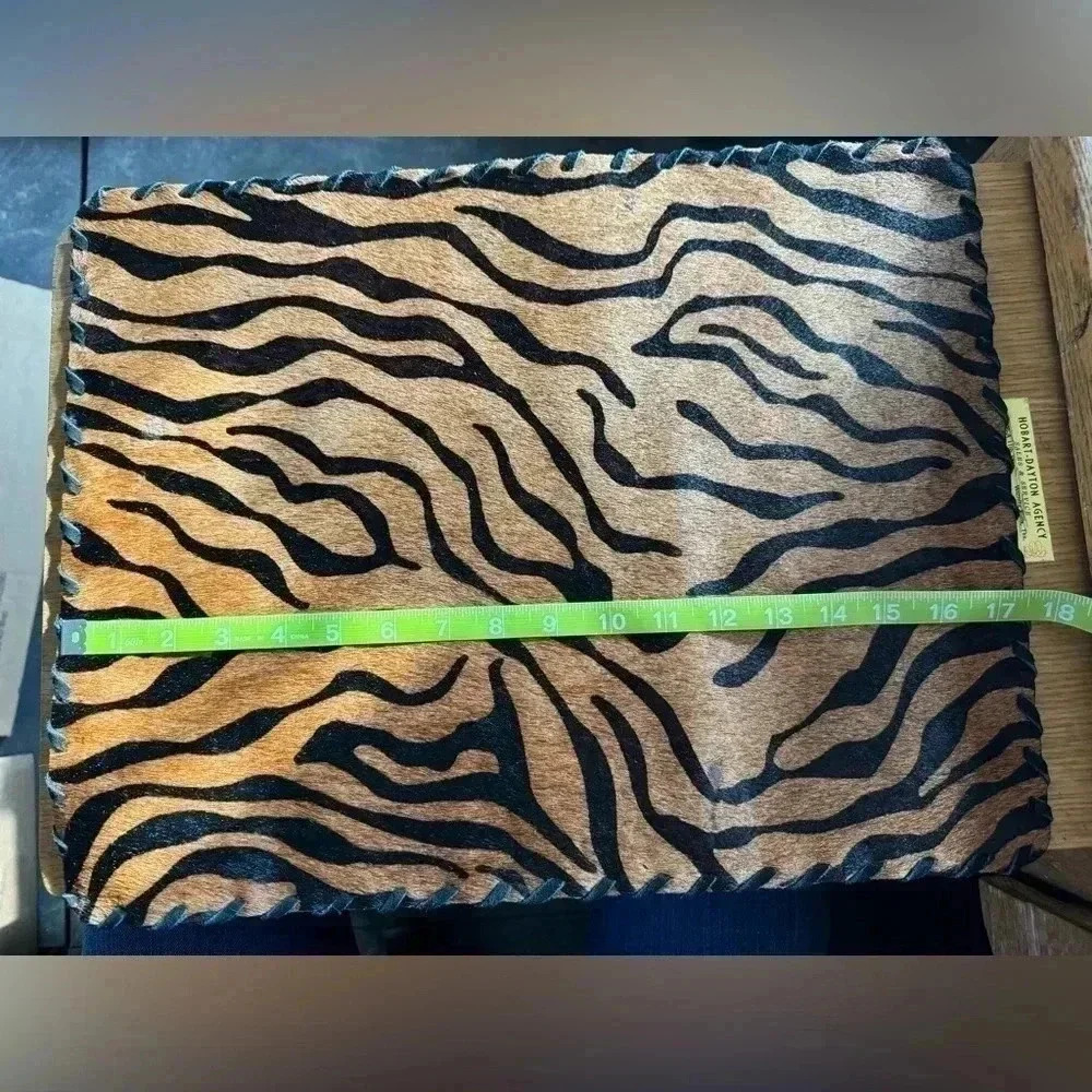 Cow hide tiger strip placemat.  A few areas where hair is gone. See photos. - Picture 3 of 7